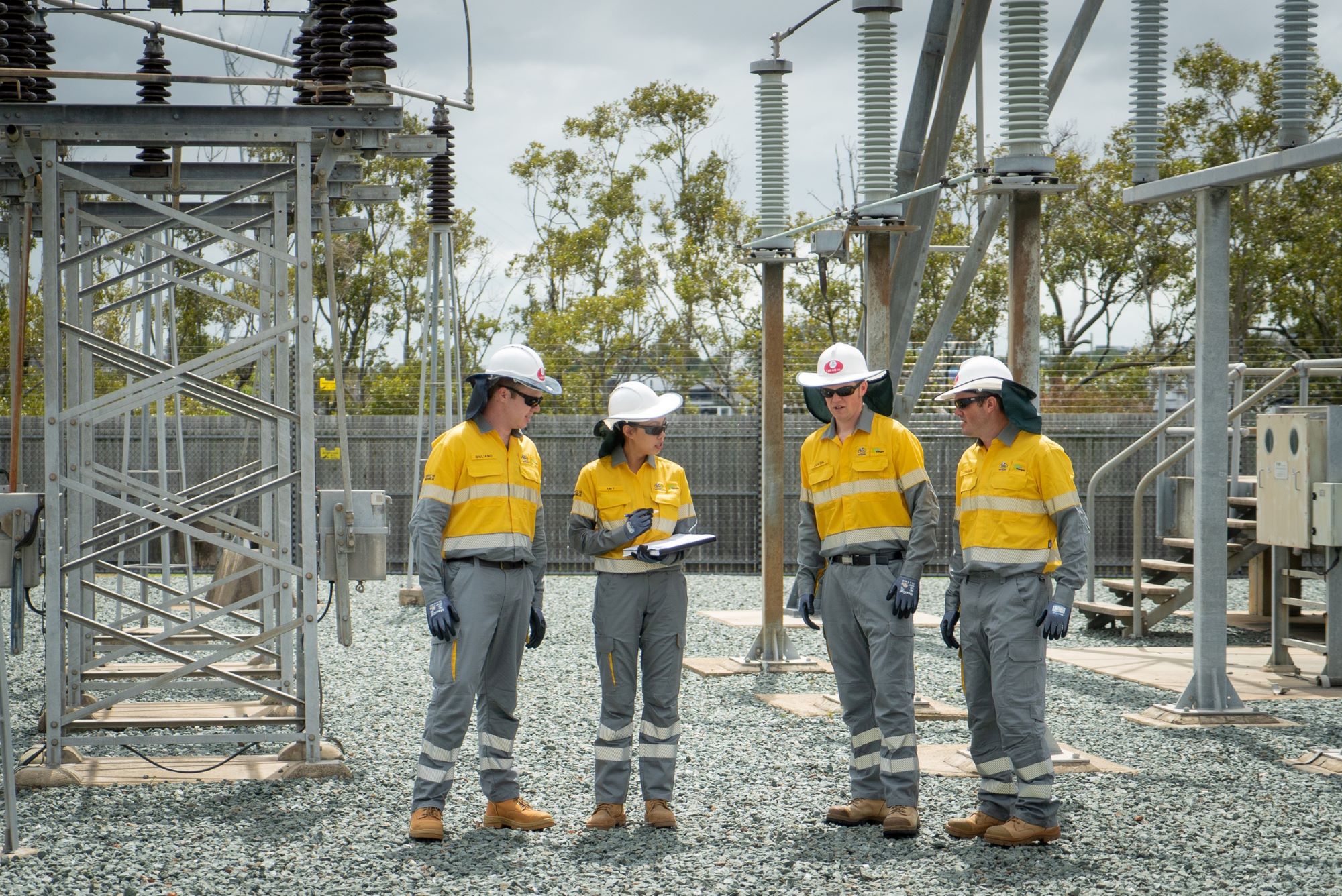 Four field crew learning in a substation