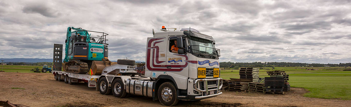 Semi trailer transporting high load machinery