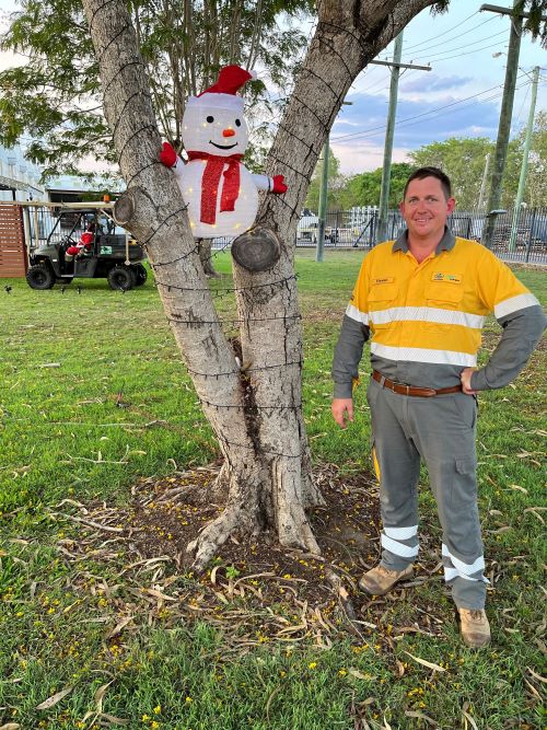 Charters Towers Work Group Leader with Christmas lights 