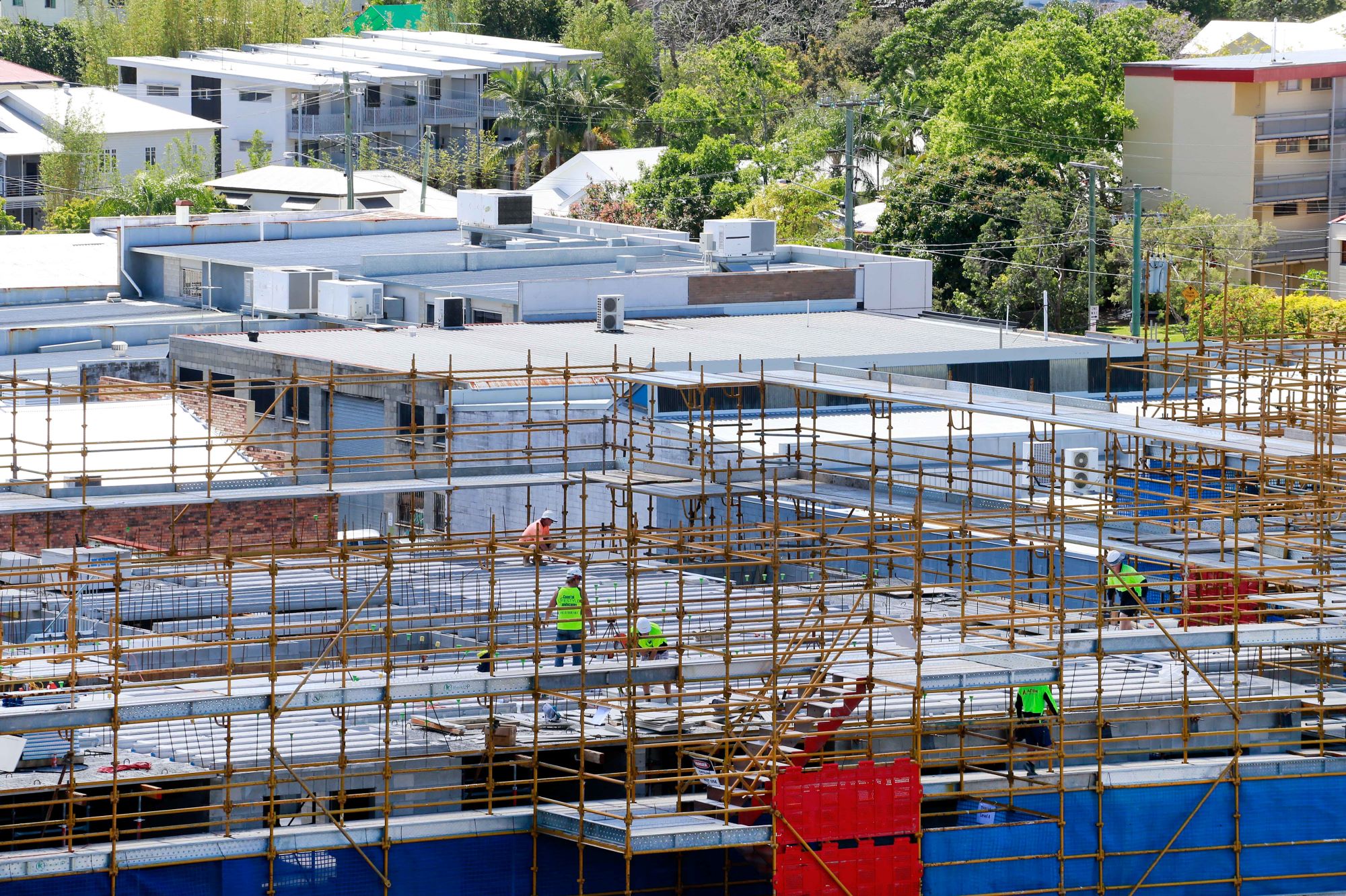 Workers on a new commercial construction site