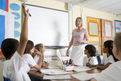 Photo of a classroom with teacher and students
