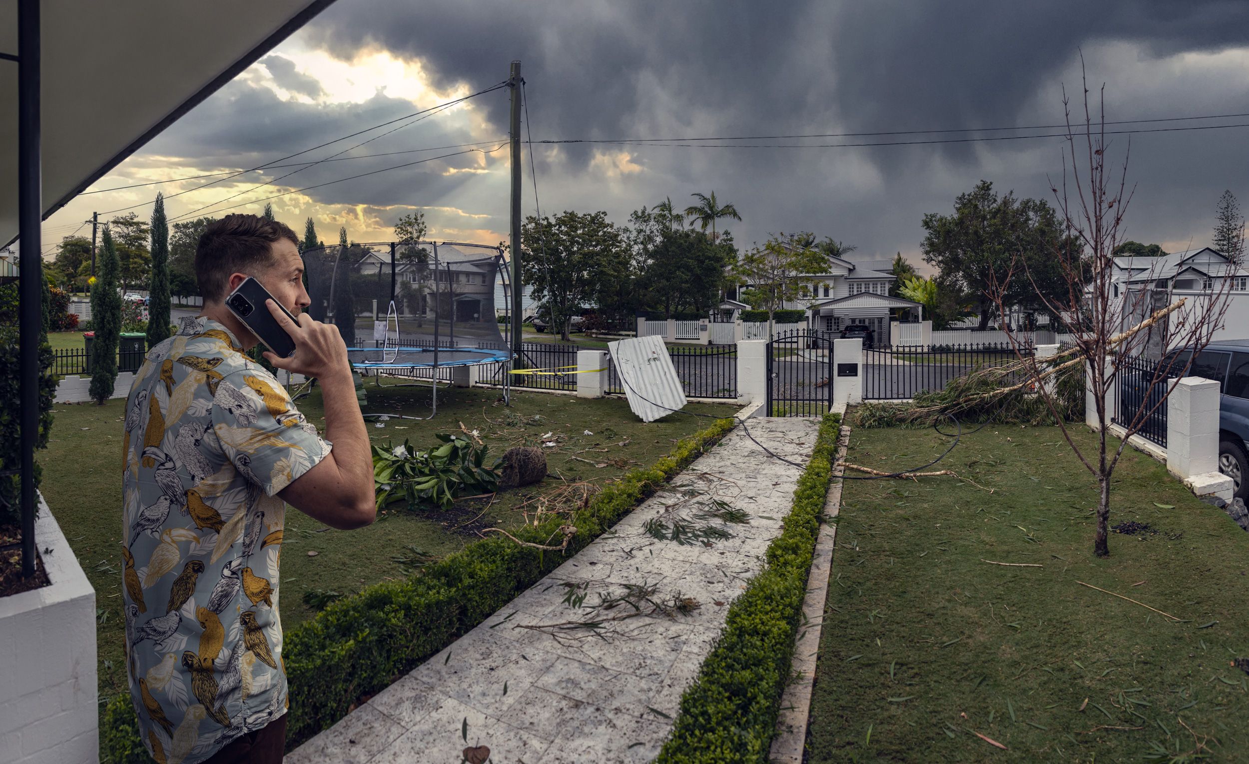 Man reporting fallen powerlines after storm