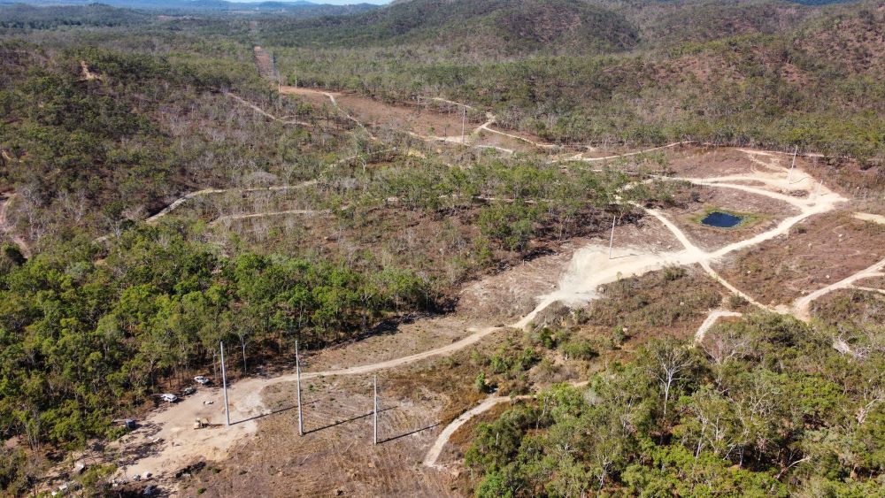 Aerial view of powerlines in Douglas shire amongst bushland
