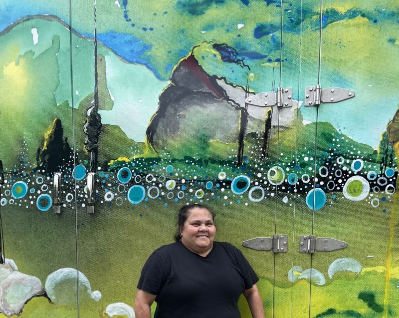 Artist Karen Gibson in front Mossman Gorge microgrid